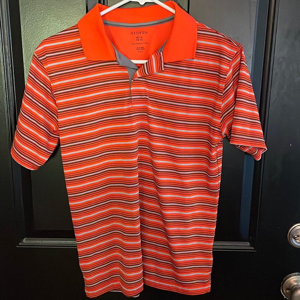 Boys short shirt size youth 14 to 16 100% polyester.